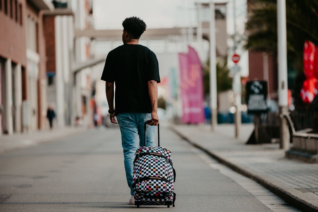 AMERICAN TOURISTER Kabinenbeutel mit Mickey Check -Rädern der städtischen Strecke